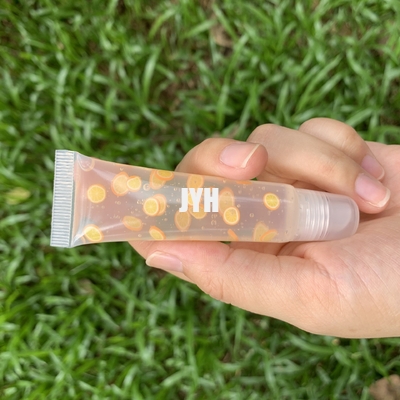 Étiquette privée L'huile de lèvre brillante Tubes de pressage à l'huile de lèvre