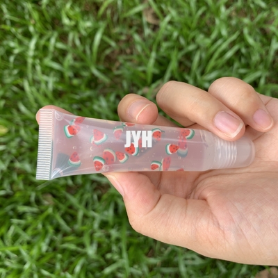 Étiquette privée L'huile de lèvre brillante Tubes de pressage à l'huile de lèvre