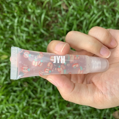 Étiquette privée L'huile de lèvre brillante Tubes de pressage à l'huile de lèvre
